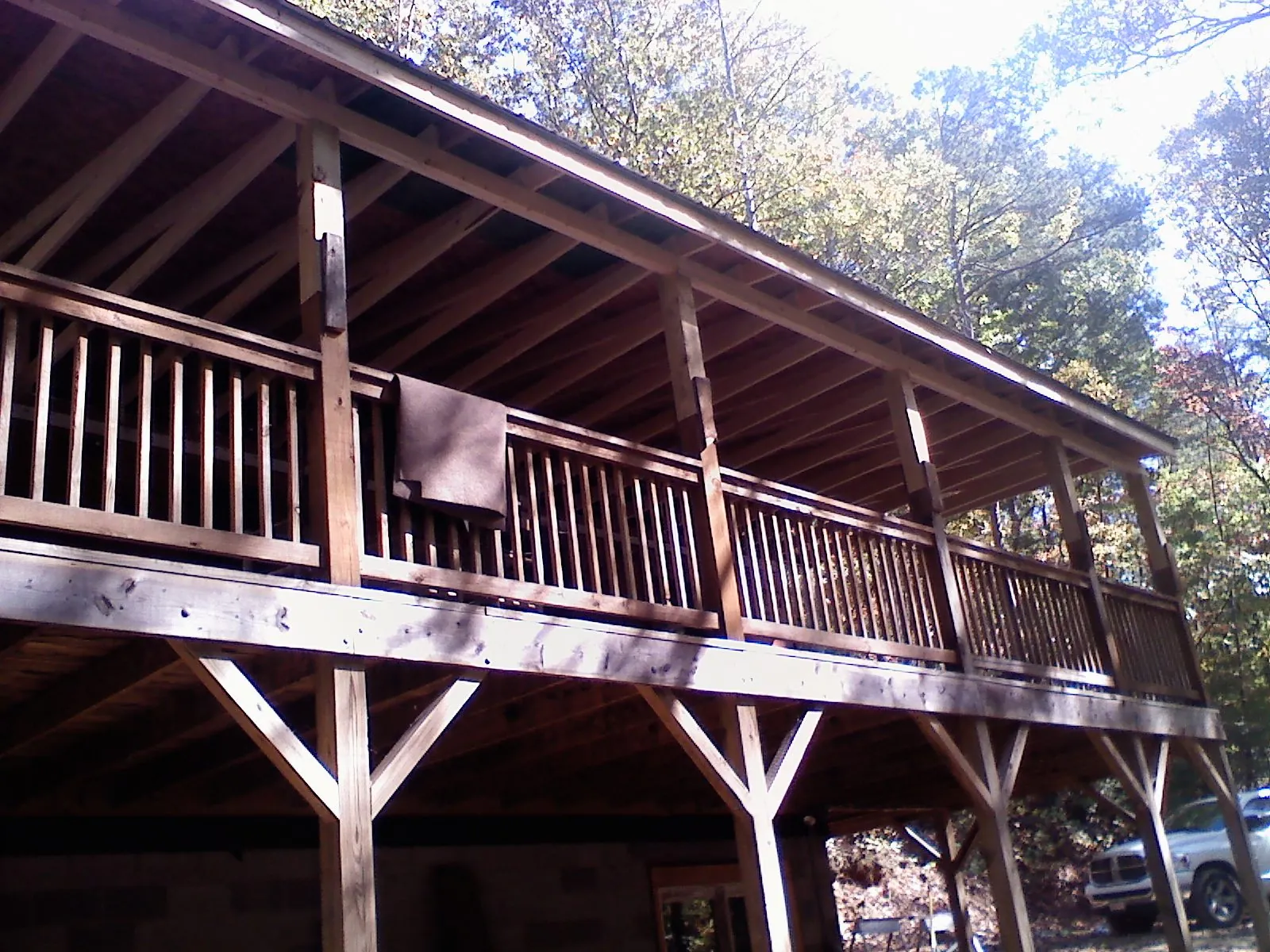 Timber framing under a new elevated porch and deck — Roof Leak Repair in Beallsville by Roofing Brothers